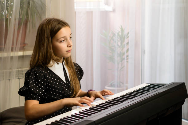 istock Focused Piano Practice at Home 1778213988
