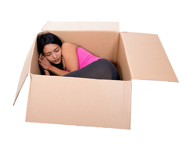 istock girl in a cardboard box 177821477