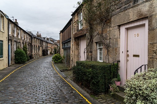 Edinburgh, United Kingdom – January 04, 2023: A scenic cobblestone alleyway in a quaint European town. Circus Lane, Edinburgh, Scotland