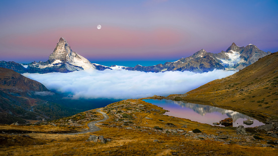 View of the Matterhorn, Swiss Alps, Valais, Switzerland mountain lake Riffelsee in the morning light
