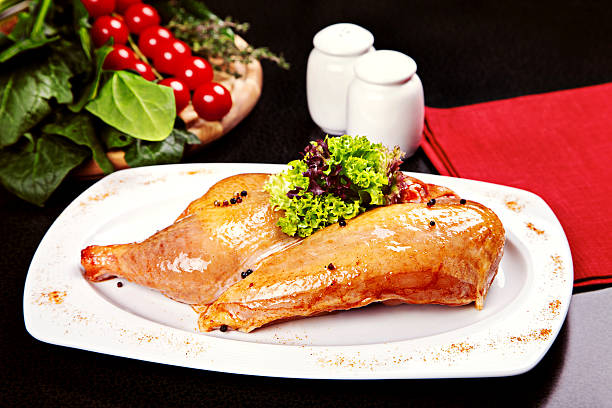 istock Raw chicken legs with lettuce and spices 177822725