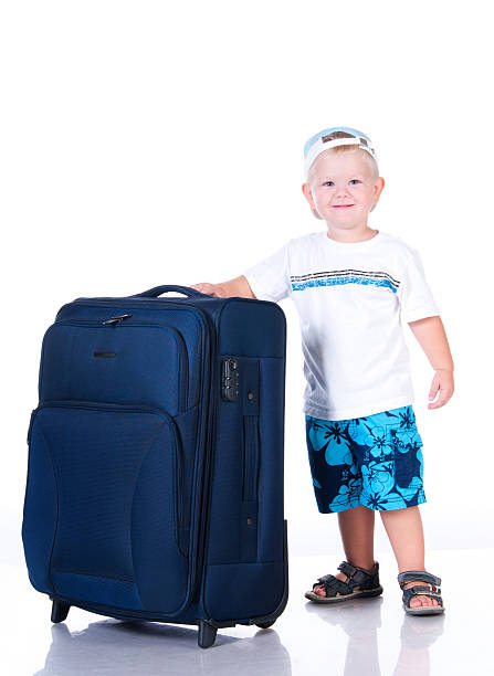 istock Small tourist with suitcase on white background 177825387