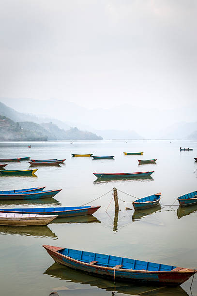 istock Boots on Fewa lake in Pokhara during misty day 177825840