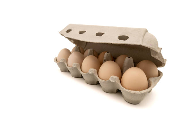 istock Cardboard egg box with ten chicken eggs isolated on white background with copy space. 1778262699