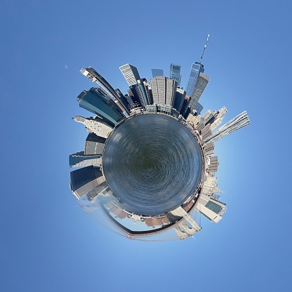 Tiny Planet view of beautiful Manhattan skyline and Brooklyn Bridge in New York City on a beautiful sunny November day in 2023