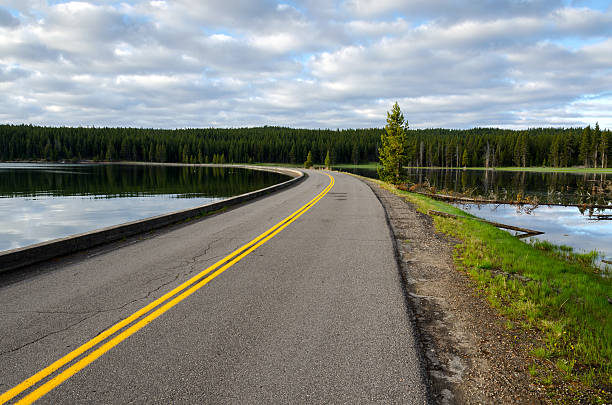 istock road in Yellowstone lake 177826490