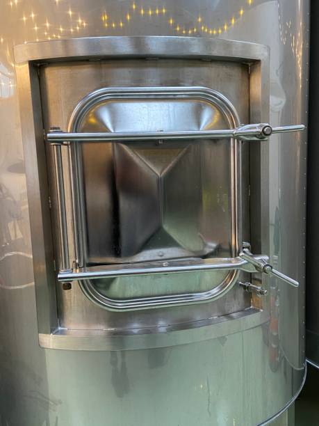 istock Fermentation vat tank of beer ale or lager at brewery micro brewery 1778266716