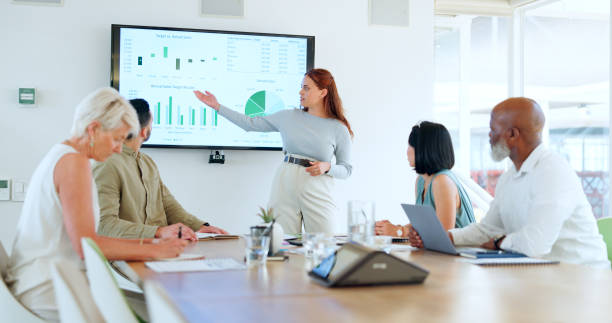istock Presentation, diversity team and speaker with chart, data analytics or infographics of stock market, economy or investment. Training workshop, business meeting and leader with digital screen monitor 1778268374