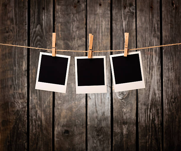 istock Blank photos hanging on clothesline. 177827124