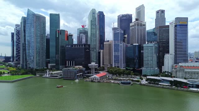Aerial 4k drone footage of Singapore skycrapers in Marina Bay, Singapore.