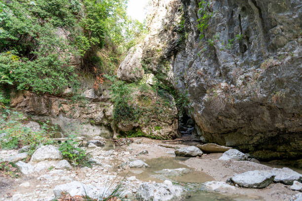 istock A walking trail following the river bed leading to a waterfall. Nydri waterfall. Lefkada. Greece. 1778279068