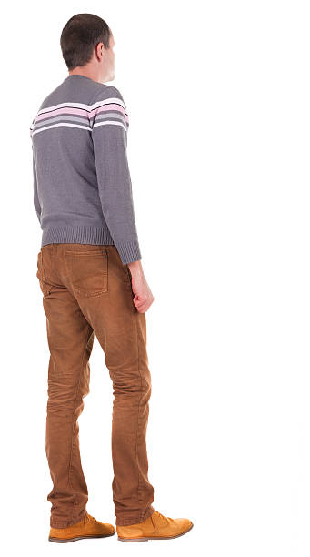 istock Back view of going  handsome man in jeans and sweater 177828220