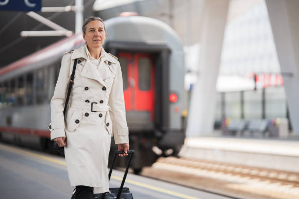 istock woman at railway station platform 1778286735