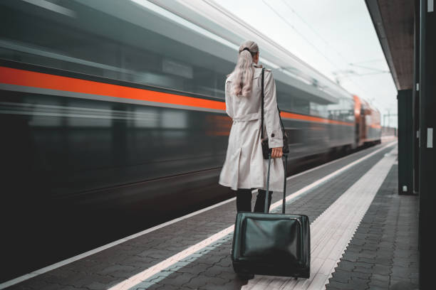 istock Business woman on the move to work at train platform 1778286754