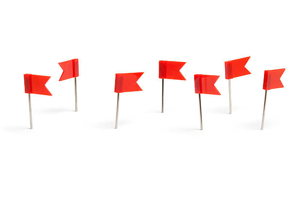 Red flag push pins stock photo