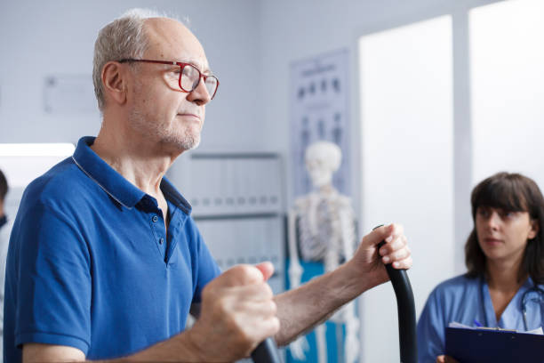 istock Elderly patient using stationary bike 1778294399