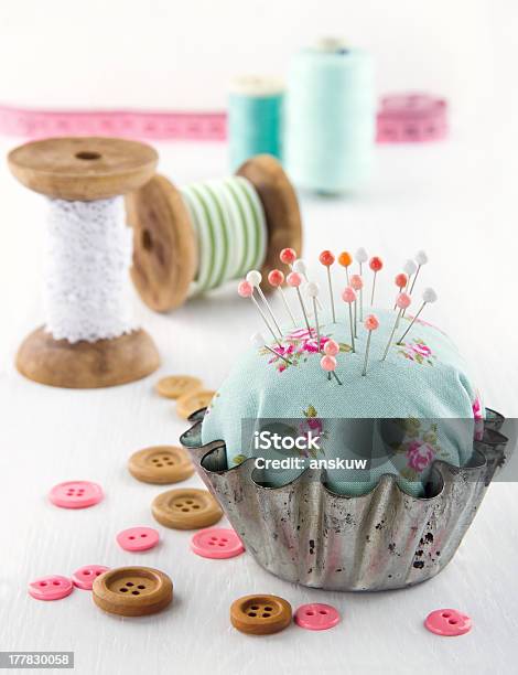 Floral Pincushion In An Old Metal Cupcake Stock Photo - Download Image Now - Pin Cushion, Sewing, Art And Craft