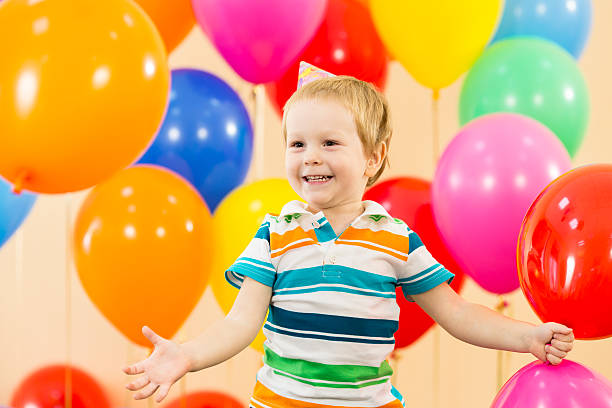 istock joyful kid boy on birthday party 177831082