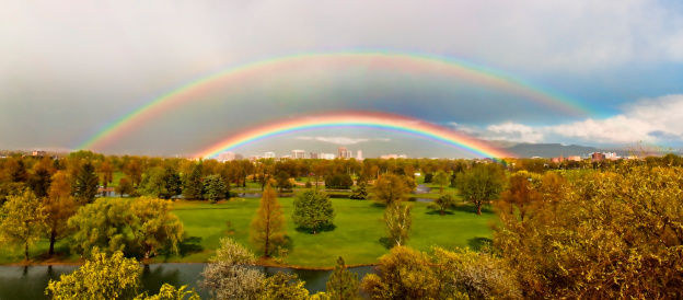 A panormaic view of double rainbows over Boise, Idaho.  With Ann Morrison Park in the foreground.