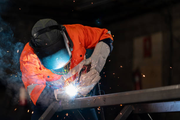 istock Dedicated craftsmen, clad in safety gear, have unveiled a groundbreaking technique for welding metal surfaces, resulting in a finish that is both impeccably smooth and exceptionally strong. Innovation and progress in the realm of metalwork. 1778315247