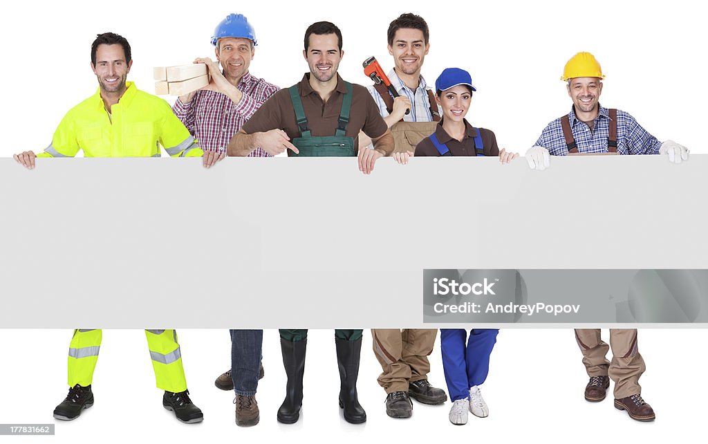Groupe de travailleurs présentant une bannière vide - Photo de Bonheur libre de droits