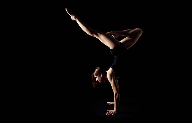 istock girl in gymnastics poses 177831969