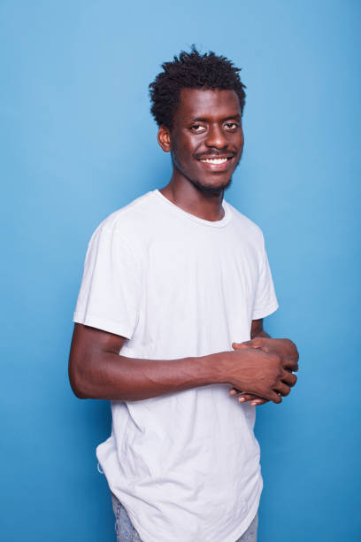istock Black man standing with arms crossed 1778322722