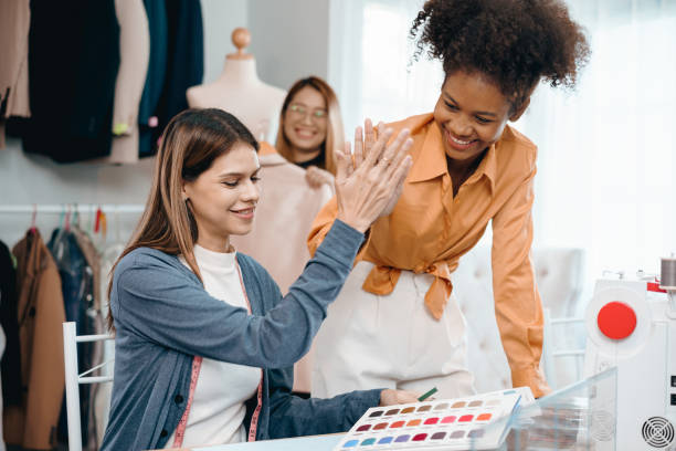 istock multi-ethnic designer group Discusses and exchange ideas for clothing design with intention and happiness. 1778326097
