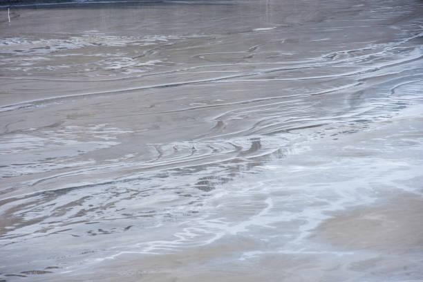 istock Muddy waters in a decantation pond. Toxic residuals from a copper mine decating in a settling basin 1778329014