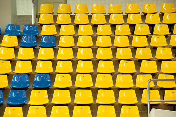 istock Colorful seats texture in basketball stadium . 177833578