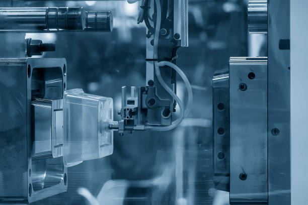istock The box container part gripping by  vacuum robotic system from injection machine. 1778337379
