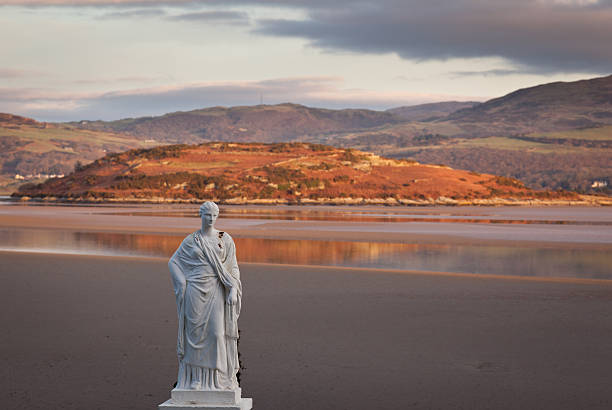 Winter scene at Portmeirion in Wales View across the estuary on the North coast of Wales in winter from Portmeirion village with statue portmeirion stock pictures, royalty-free photos & images