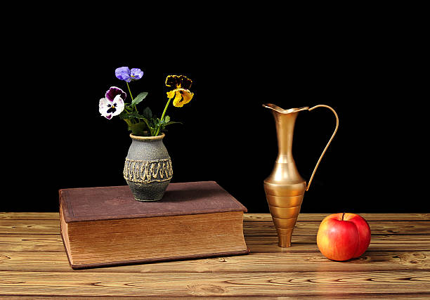 istock Books and flowers in a vase 177834540