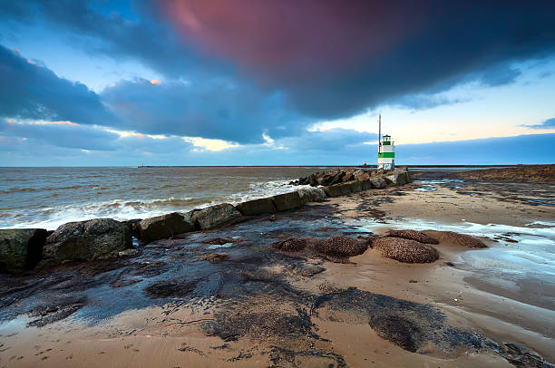 istock lighthouse on North sea at sunset 177834744
