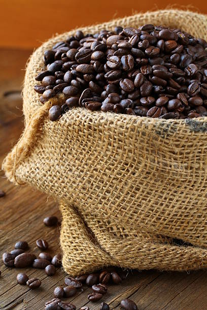 istock linen bag with coffee beans on wooden table 177834811