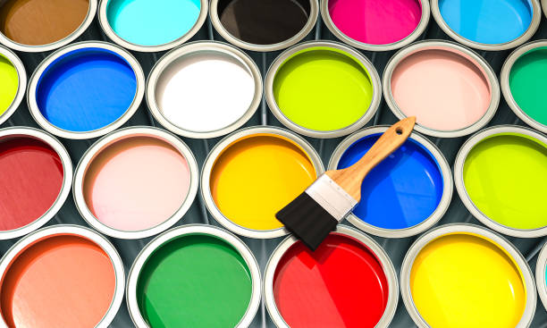 istock group of cans filled with coloured paint with brush. 1778357397