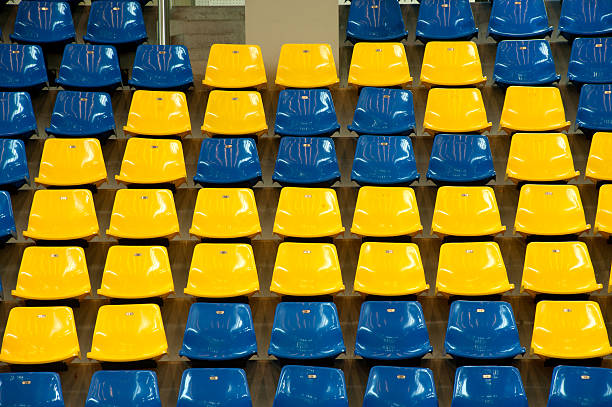 istock Colorful seats texture in basketball stadium . 177835946