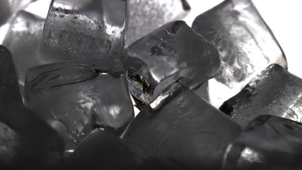 istock Ice cubes on black background. Low key photo. 1778363117