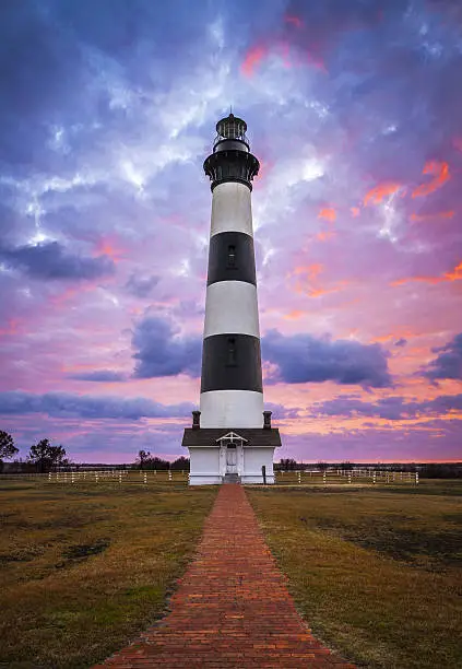 Bodie Island Lighthouse Cape Hatteras National Seashore Outer Banks NC blue and pink sunrise in Nags Head North Carolina