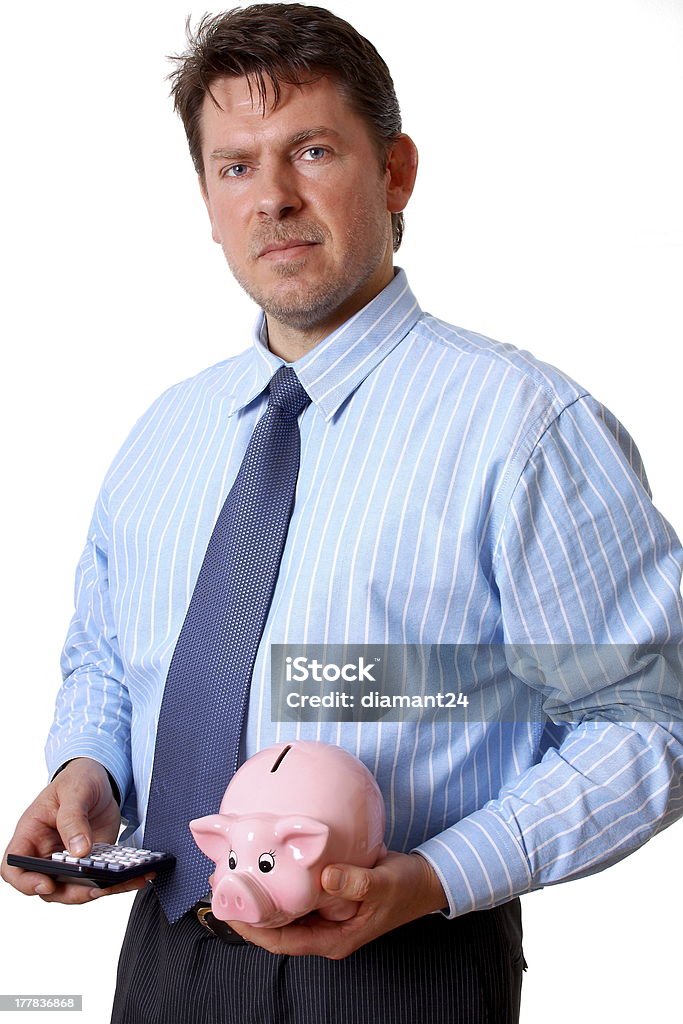 Uomo d'affari con calcolatrice e rosa Salvadanaio a porcellino - Foto stock royalty-free di Adulto