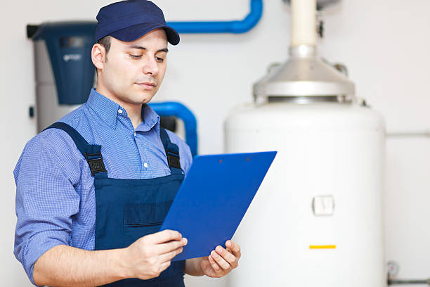 istock Technician repairing an hot-water heater 177837020