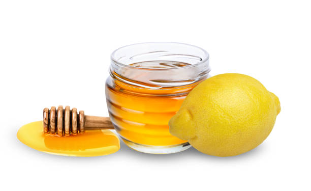 istock Lemon and honey isolated on white background. 1778370892