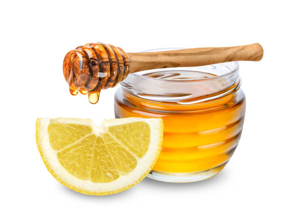 istock Lemon and honey isolated on white background. 1778373050