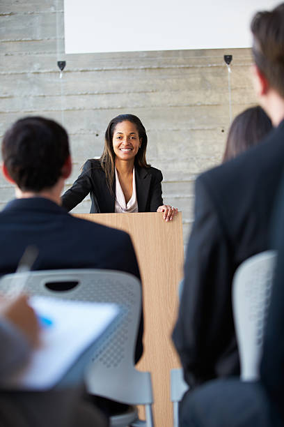 istock Businesswoman Delivering Presentation At Conference 177837980