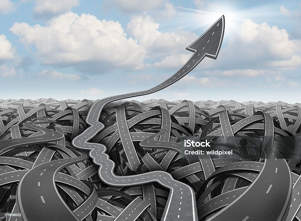 Planning And Success Strategy Planning and success strategy as tangled confused three dimensional group of roads and highways and a clear path in the shape of a human head as a detour past the confusion going up into an arrow aiming at the sky. Road Stock Photo