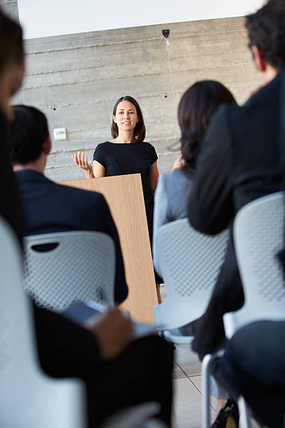istock Businesswoman Delivering Presentation At Conference 177838343