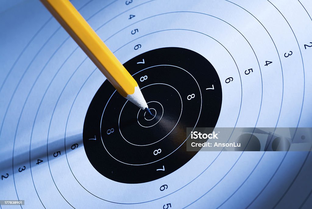 Pen hits the target The pen hits the target, think and act for success Planning Stock Photo