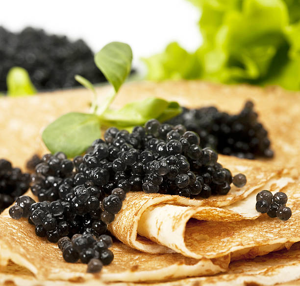 istock pancakes with black caviar 177839951