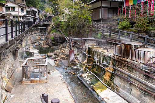 Tanabe, Wakayama, Japan-April 4, 2023; Yunomine Onsen hot spring system running as a river along Kumano Kodo pilgrimage trail and UNESCO site