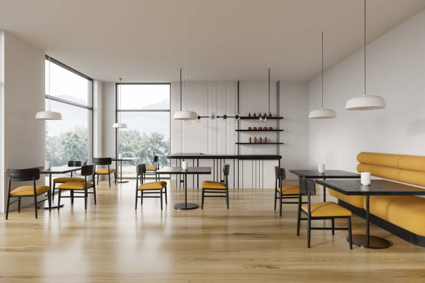 istock Stylish cafe interior with chairs and table, bar counter near panoramic window 1778414797